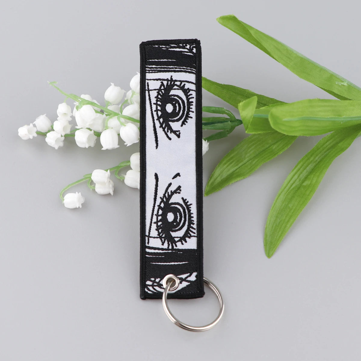 NANA Anime Eye Keychain for Motorcycles and Cars Backpack Manga Key Tag Cartoon Embroidery Key Fobs Bag Keyring Chaveiro Jewelry